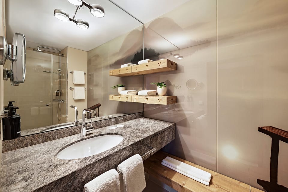 Eco-friendly toiletries, hair dryer, towels, soap