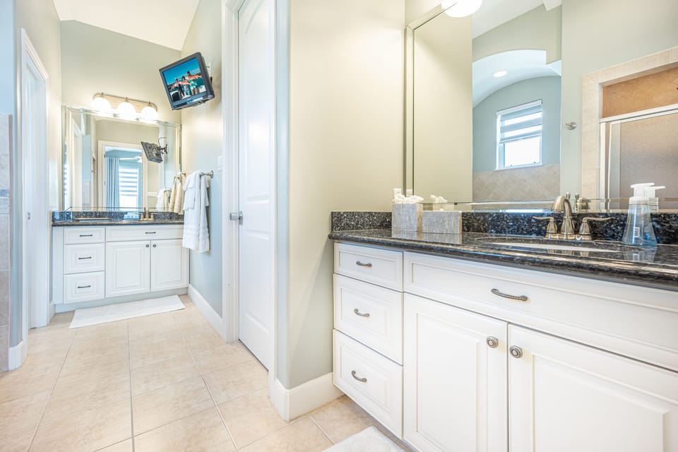 The en-suit bathroom is spacious with 2 vanities and plenty of counter space.