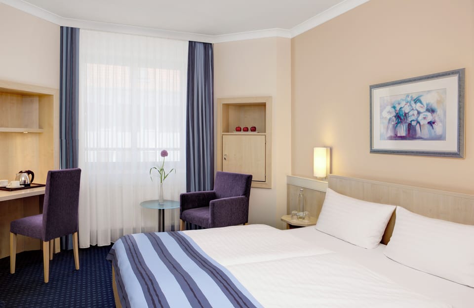 Hypo-allergenic bedding, in-room safe, desk, laptop workspace
