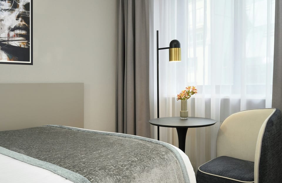 Hypo-allergenic bedding available, in-room safe, desk, laptop workspace