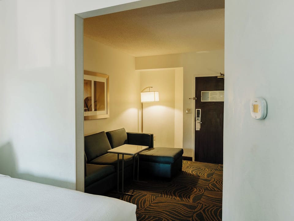 Suite, 2 Queen Beds | Living area | TV