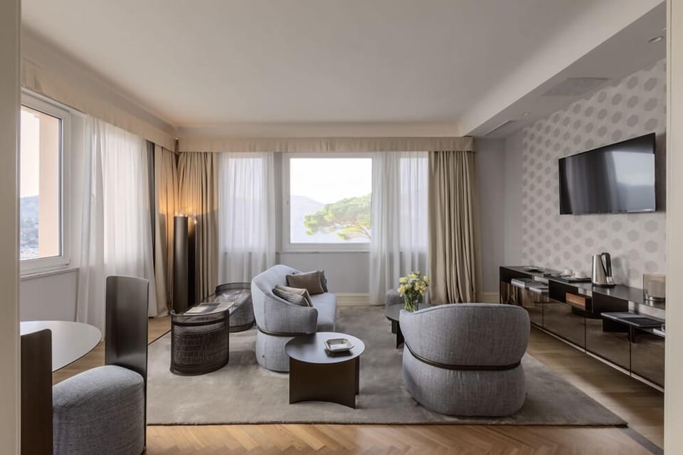 Portofino Panoramic Suite, two bedroom, Terrace, Sea View | Living area | 42-inch LCD TV with digital channels, TV, Netflix