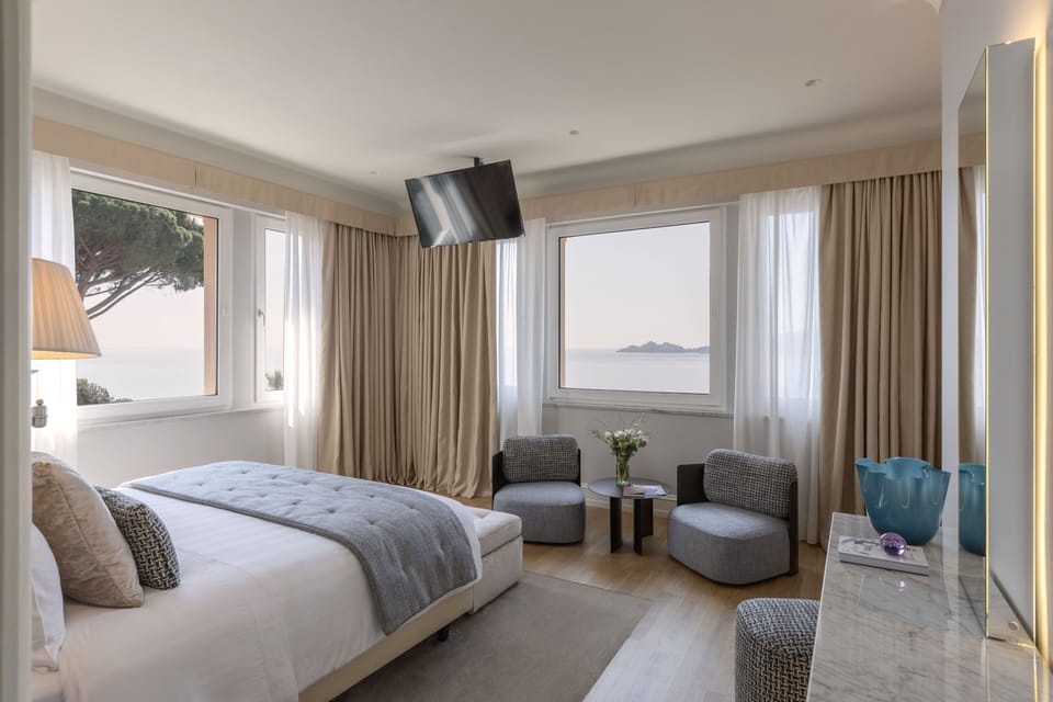 Panoramic Suite, 2 Bedrooms, Sea View | Free minibar items, in-room safe, desk, blackout drapes