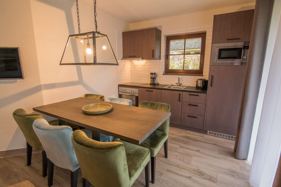 Cottage, Kitchen (Typ C) | Private kitchen | Highchair