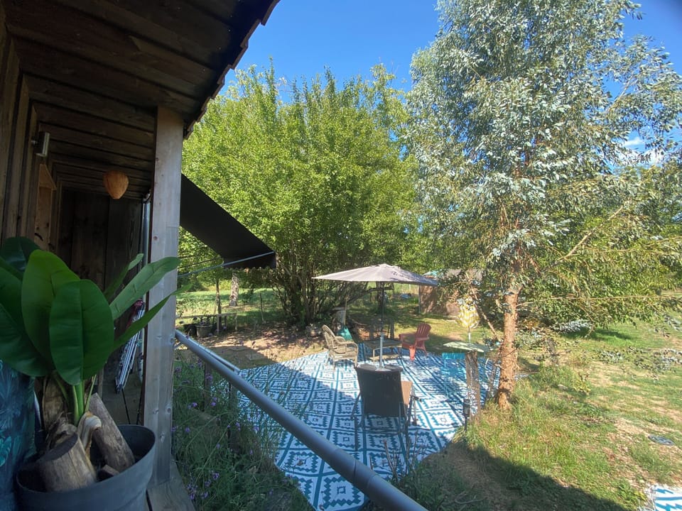 1 of 2 private gite terraces, here in shared with owners garden, shade or sun 
