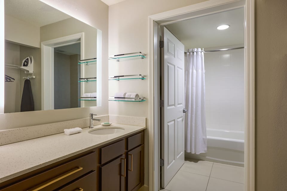 Suite, 1 Bedroom | Bathroom | Hair dryer, towels