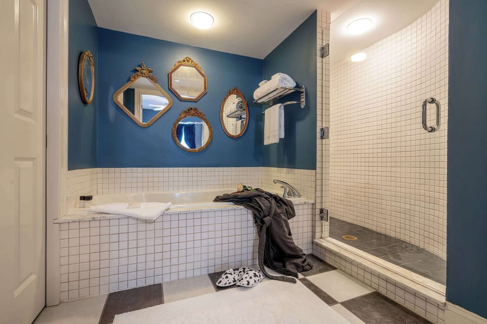 Designer toiletries, hair dryer, bathrobes, towels