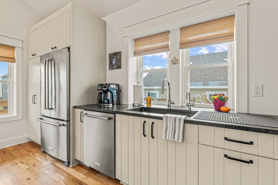 Quartz countertops offer plenty of workspace in the kitchen