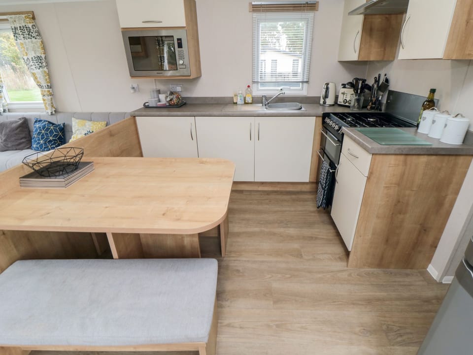 Fridge, electric kettle, toaster, cookware/dishes/utensils