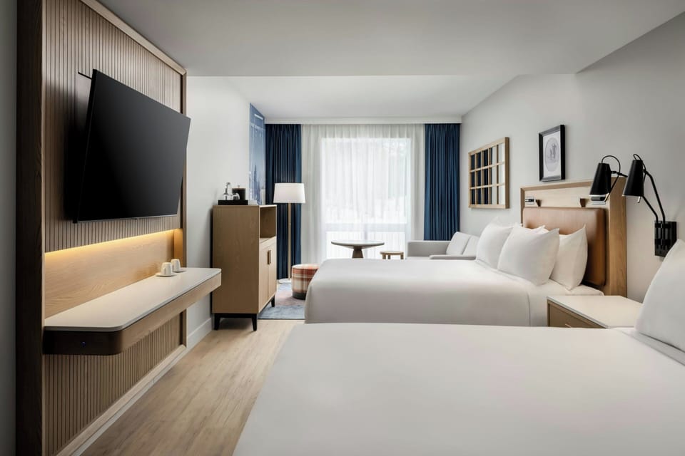 Room, 2 Queen Beds, Garden View | In-room safe, desk, laptop workspace, blackout drapes