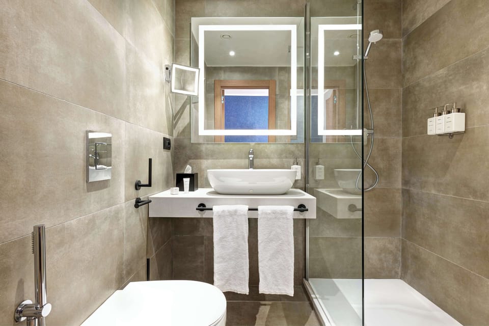 Shower, rainfall showerhead, eco-friendly toiletries, hair dryer