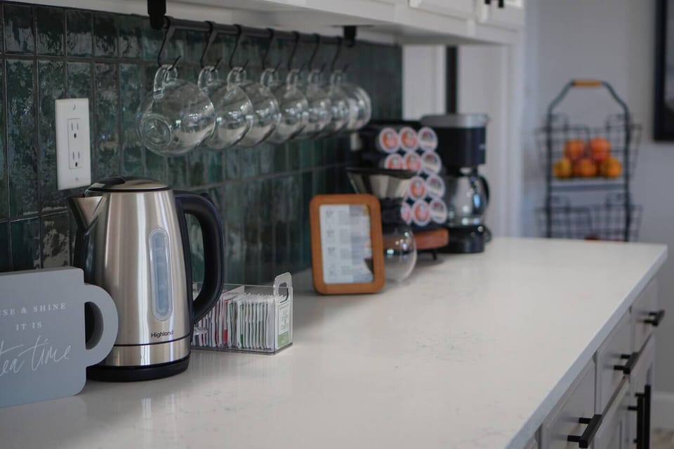 Now this is what a coffee bar should look like! We provide a starter supply of k cups and ground coffee, lots of teas and a fun ways to make unique festive drinks for all seasons. 
