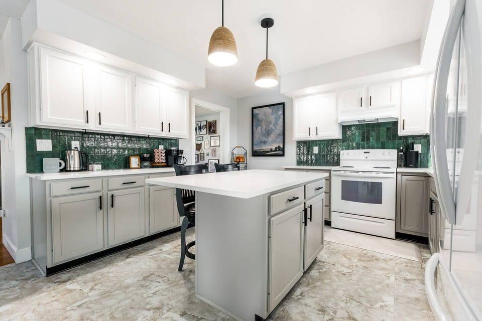 Cook meals and make fancy drinks! This kitchen is fully equipped with baking dishes, utensils, kids dishes, drink ware, appliances, and a spacious island for prepping. 