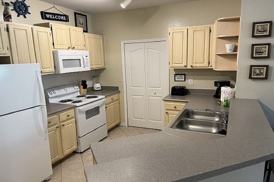 Microwave, Stove, Toaster, Coffee Maker, Pots, Pans, Dishes and so much more
