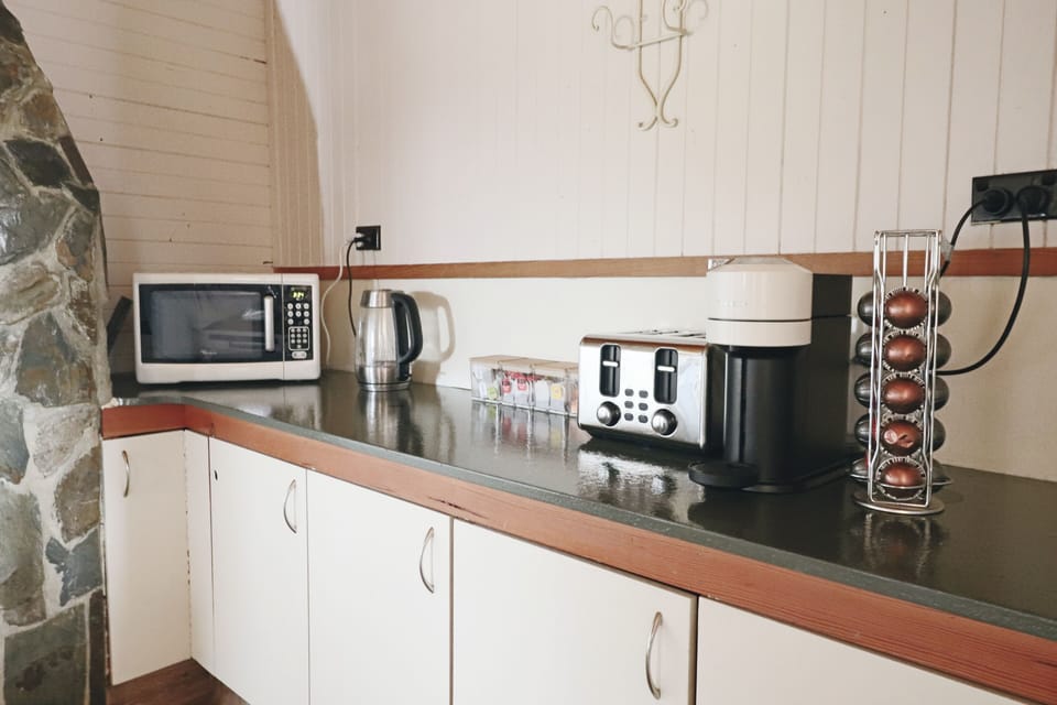 Microwave, kettle, toaster, Nespresso machine, coffee pods, tea 