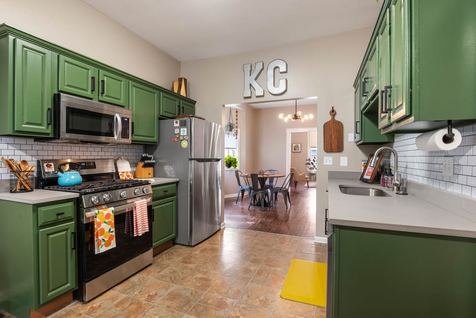 Spacious, modern kitchen featuring stainless appliances and ample prep space, just steps from the 39th Street dining district.