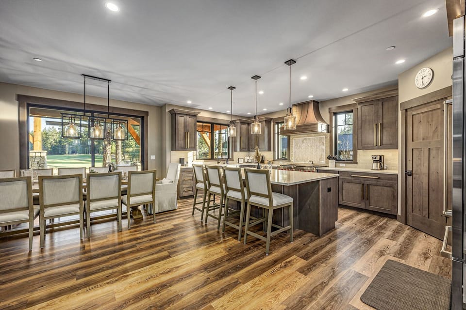 Kitchen dining for 18 — RH table seats 12 plus 6 bar stools at the island