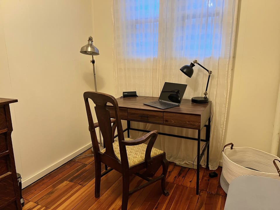 Office #2: Sitting room adjoining Bedroom #2, converted to a home office.