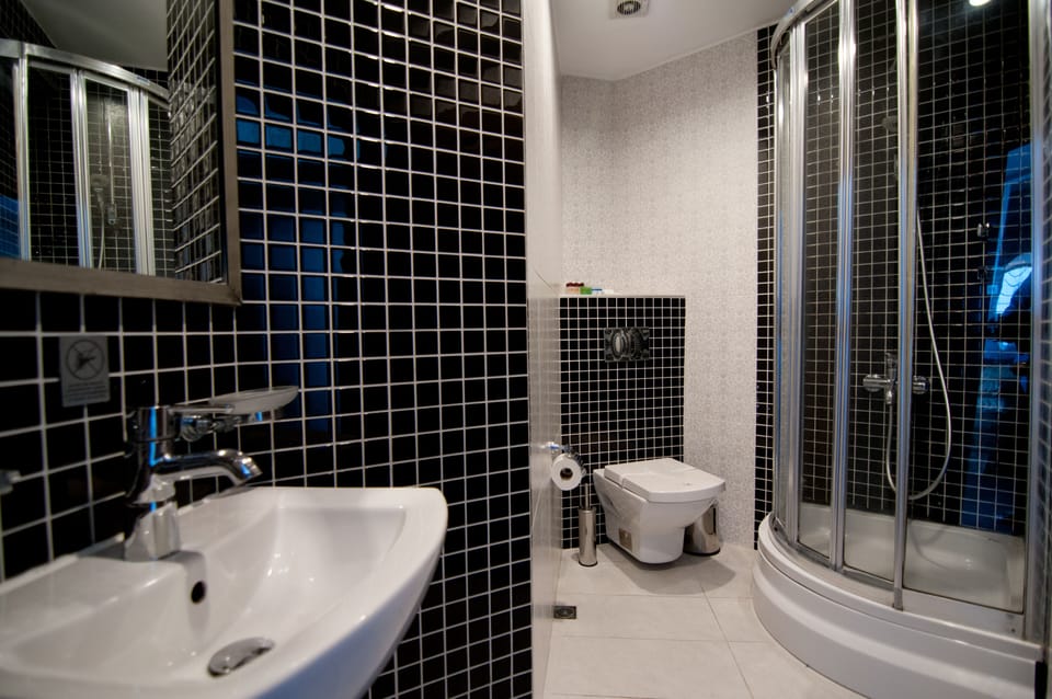 Superior Suite, Sea View | Bathroom | Shower, designer toiletries, hair dryer, slippers