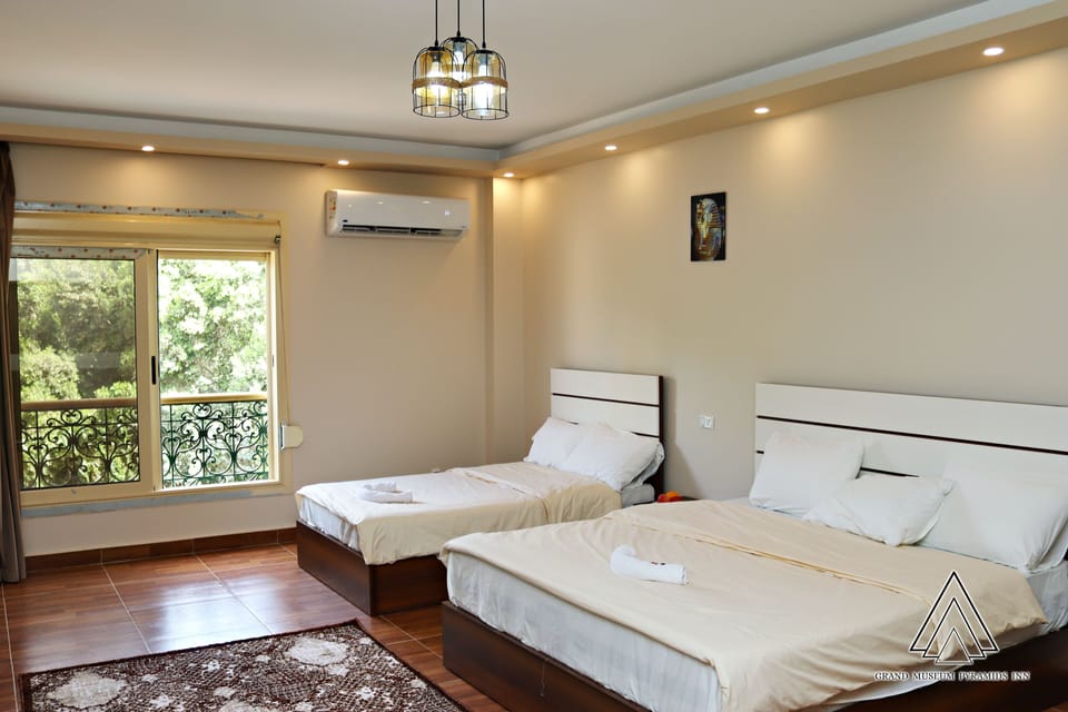 Luxury Suite, 1 Bedroom, Private Bathroom, Garden View | Minibar, blackout drapes, iron/ironing board, free WiFi