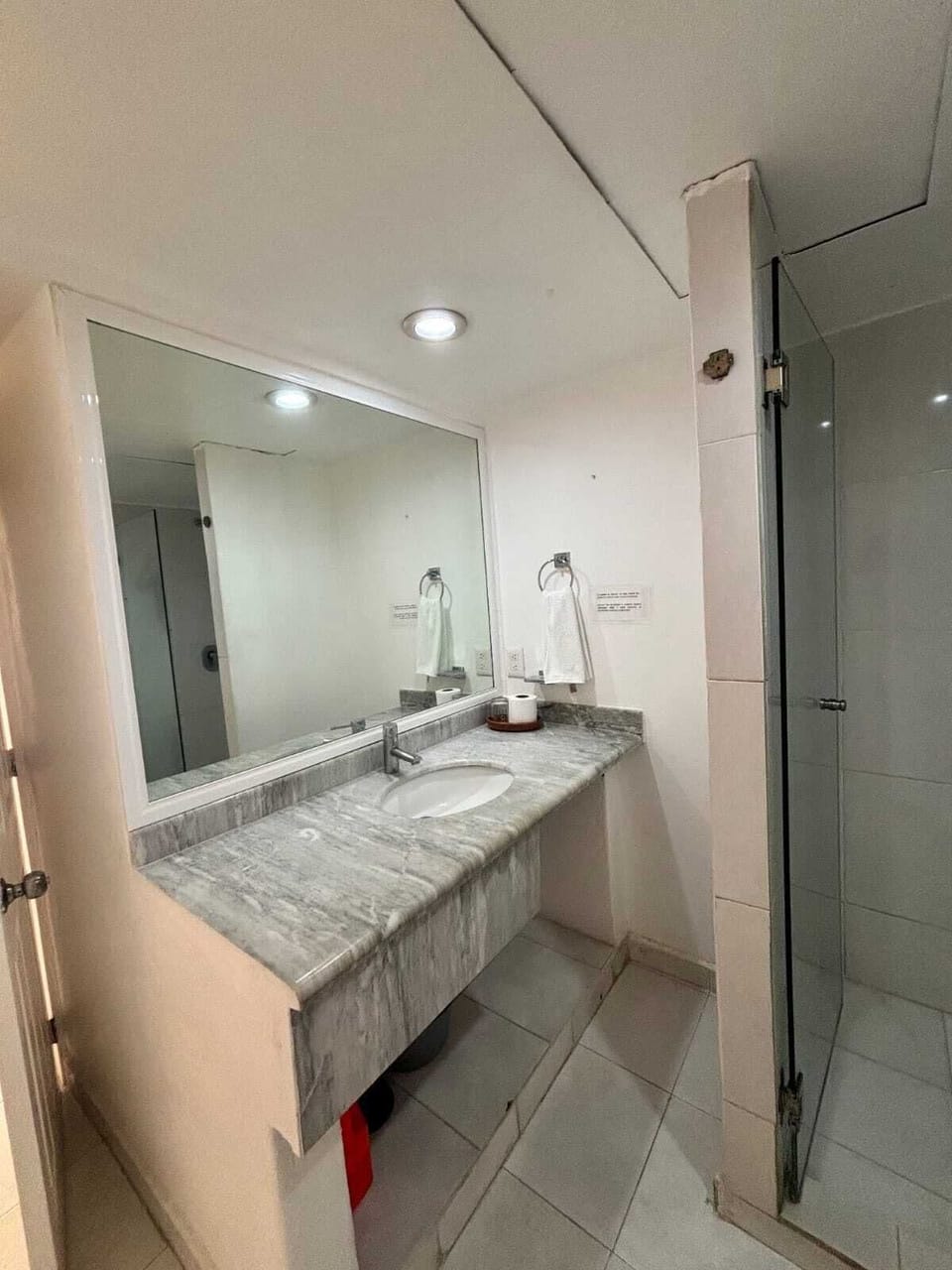 Family Studio | Bathroom | Shower, rainfall showerhead, towels, soap
