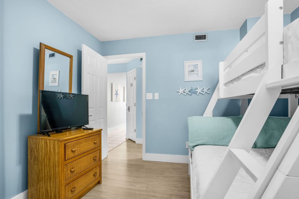 Bunk room with flat screen