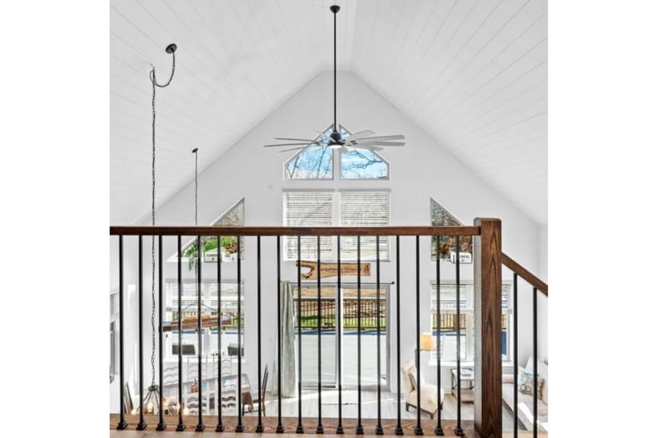 Looking down from second floor with bedrooms.  Stairs are child proof.