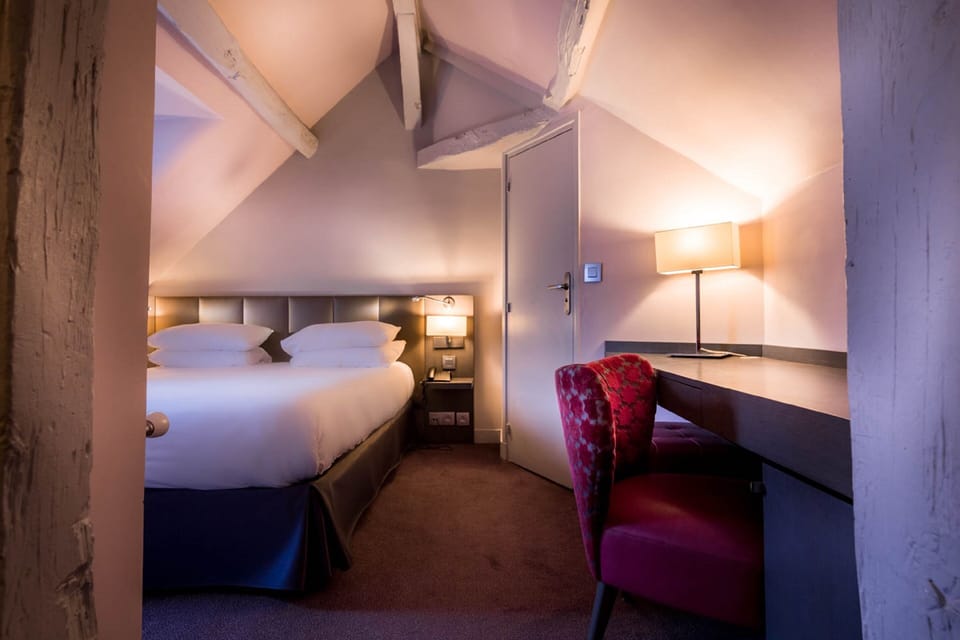 Family Quadruple Room | Premium bedding, minibar, in-room safe, blackout drapes