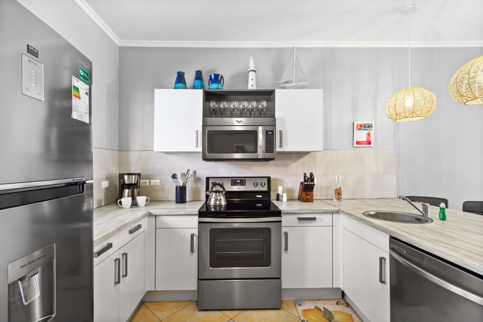 Cook in style with our fully equipped kitchen, complete with contemporary appliances designed for efficiency and ease.