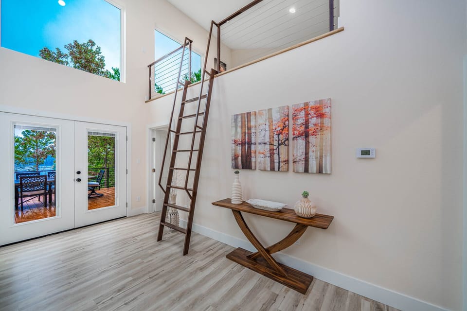ladder to 'yoga' room with large futon