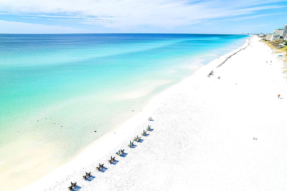 Sugar white sand beach of Emerald Coast that is just a short walk away!