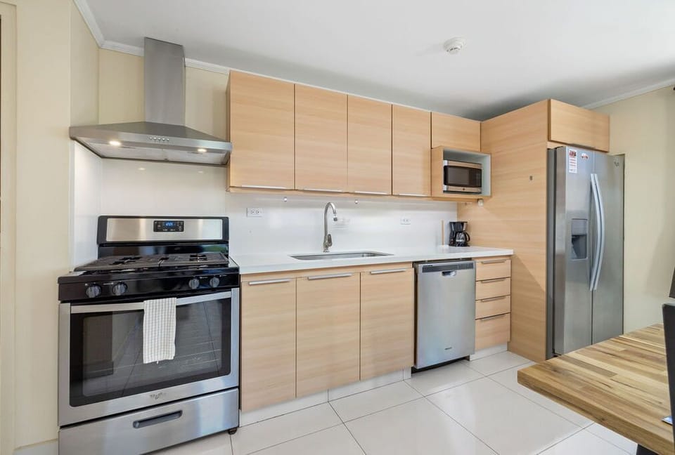The kitchen has everything you need to cook meals at home or entertain friends.