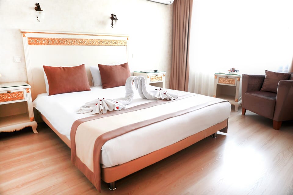 Standard Double or Twin Room | Minibar, in-room safe, desk, blackout drapes