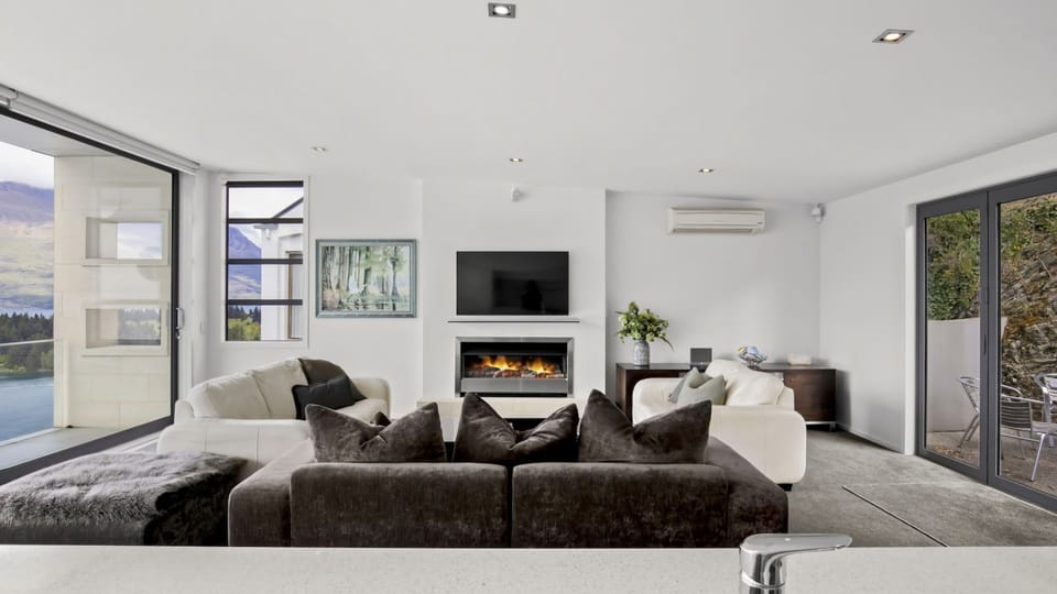 Living Room with Gas Fireplace and heatpump/aircon