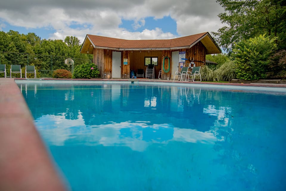 Pool shed with outdoor bathroom.