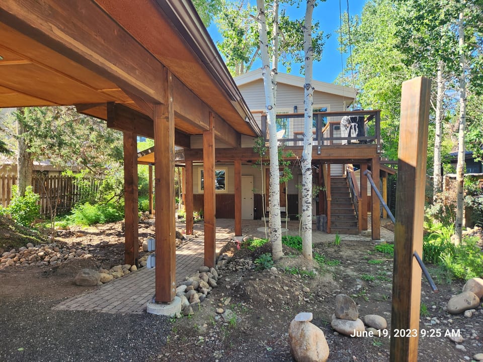 A covered walkway from the carport to the house protects you from rain and sun.