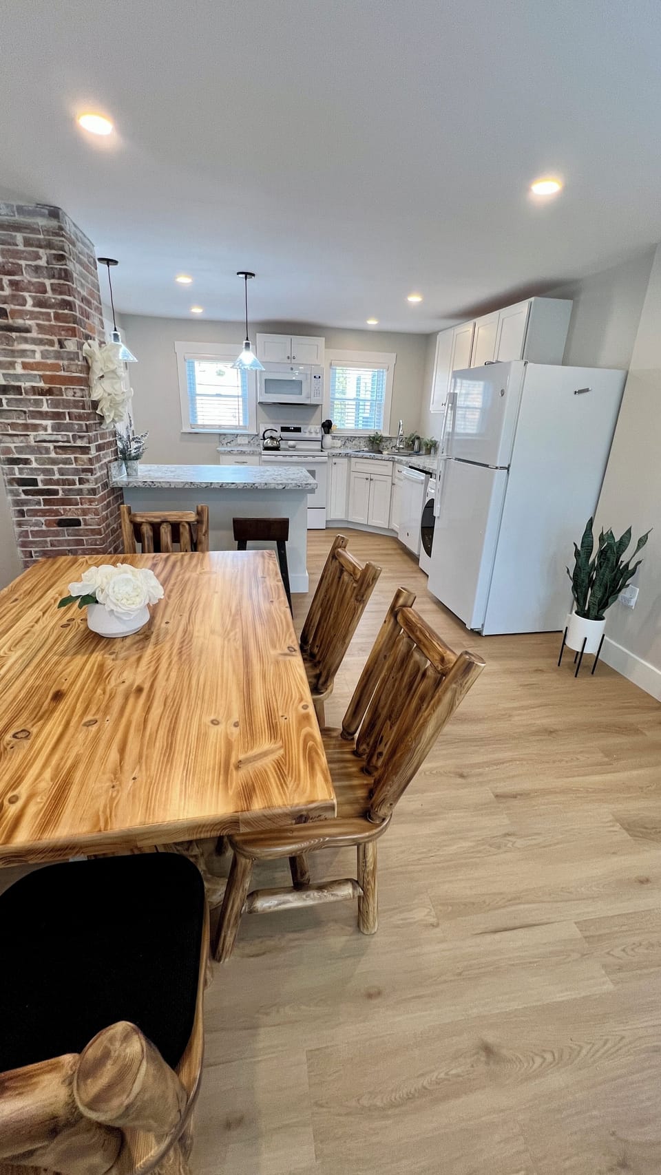 Dining room table and kitchen area
