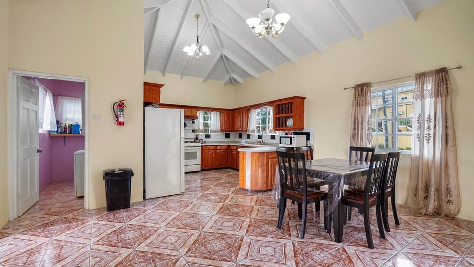 Dining room view and kitchen 