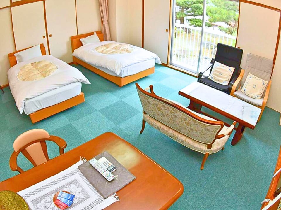 Twin Room, Non Smoking | In-room safe, free WiFi, bed sheets