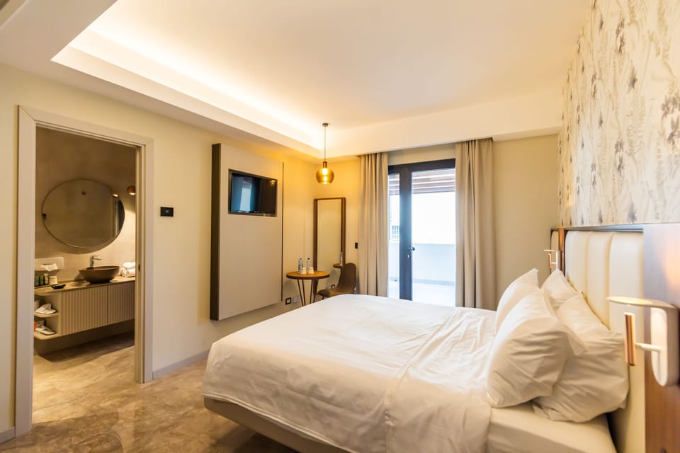 Standard Double Room, Patio, Ground Floor | Premium bedding, down comforters, pillowtop beds, minibar