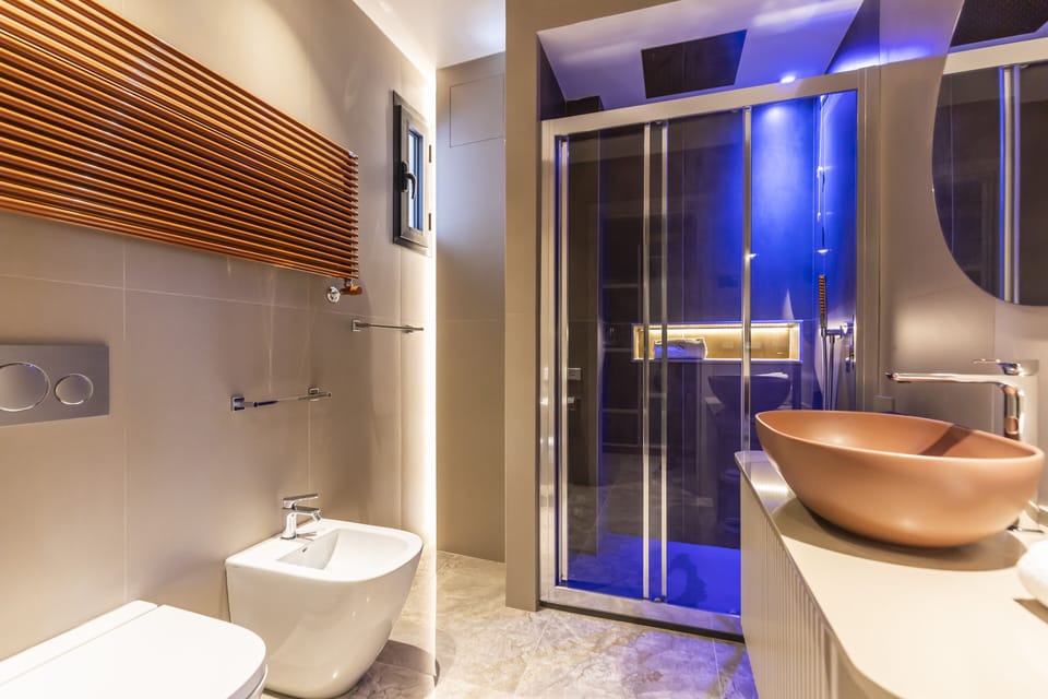 Basic Suite, 1 King Bed with Sofa bed, Balcony, Partial Sea View | Bathroom | Eco-friendly toiletries, hair dryer, slippers, bidet