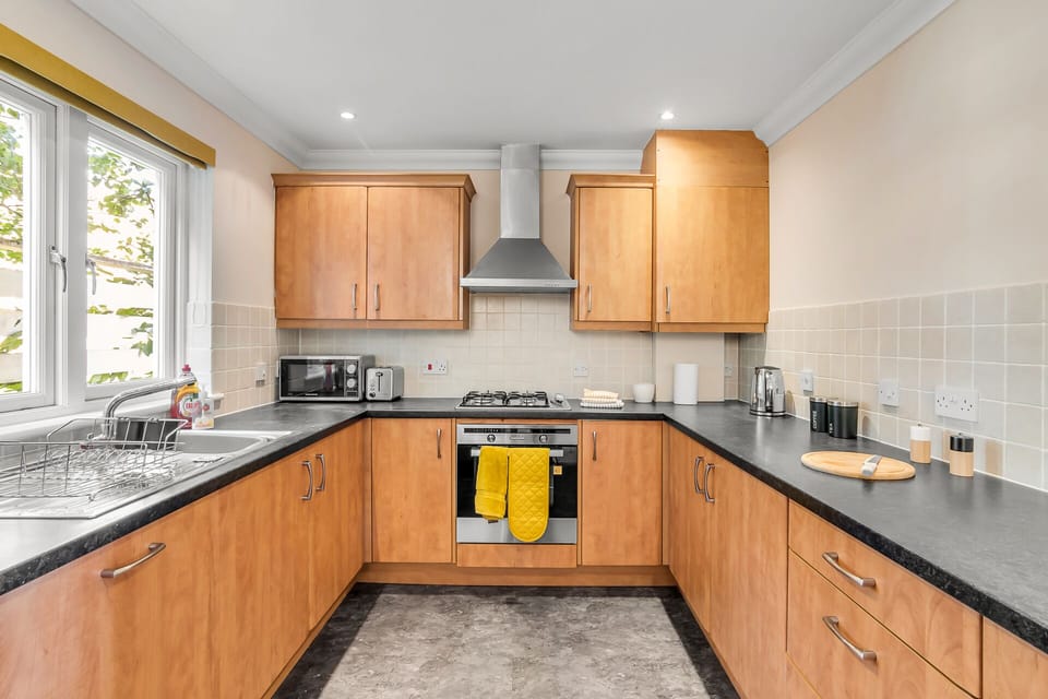 Fully equipped kitchen stocked with the basics
