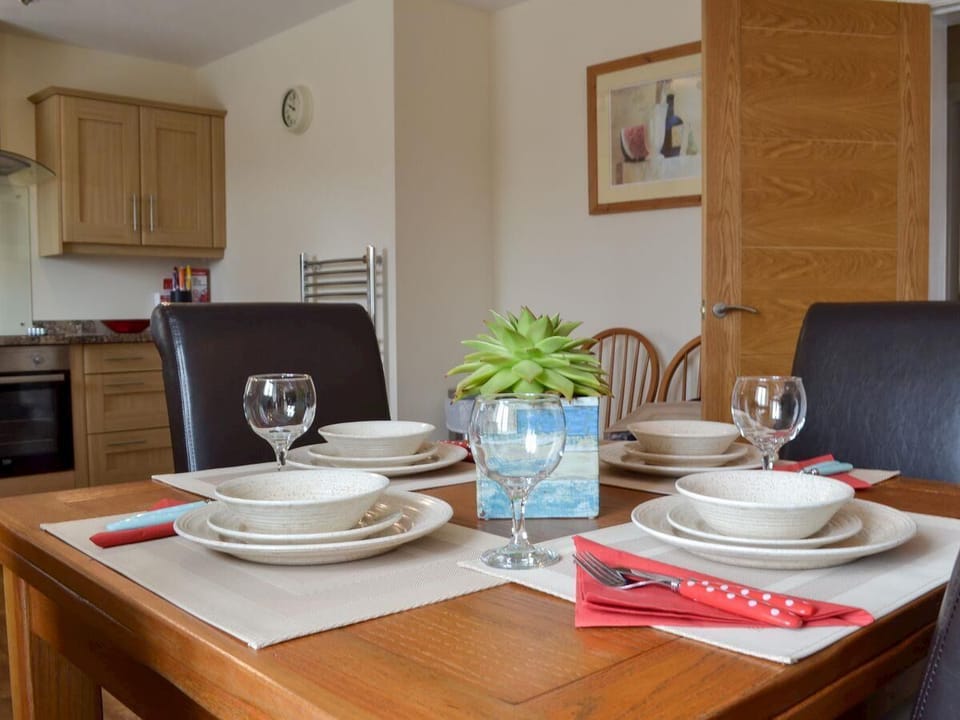 Dining table extends out to double size.