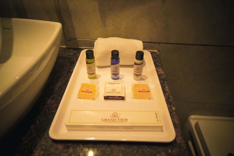 Shower, free toiletries, slippers, towels