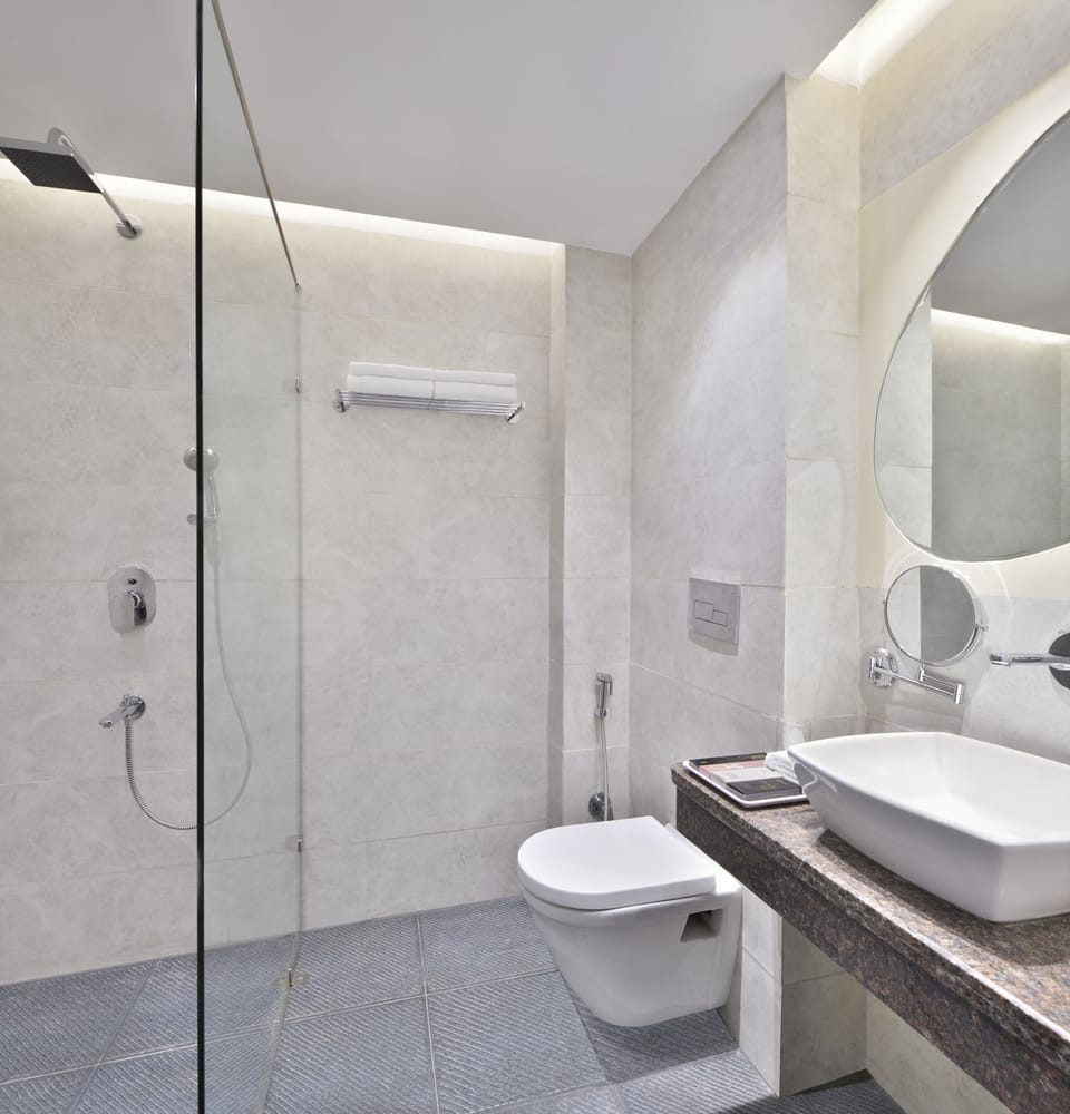 Shower, free toiletries, slippers, towels
