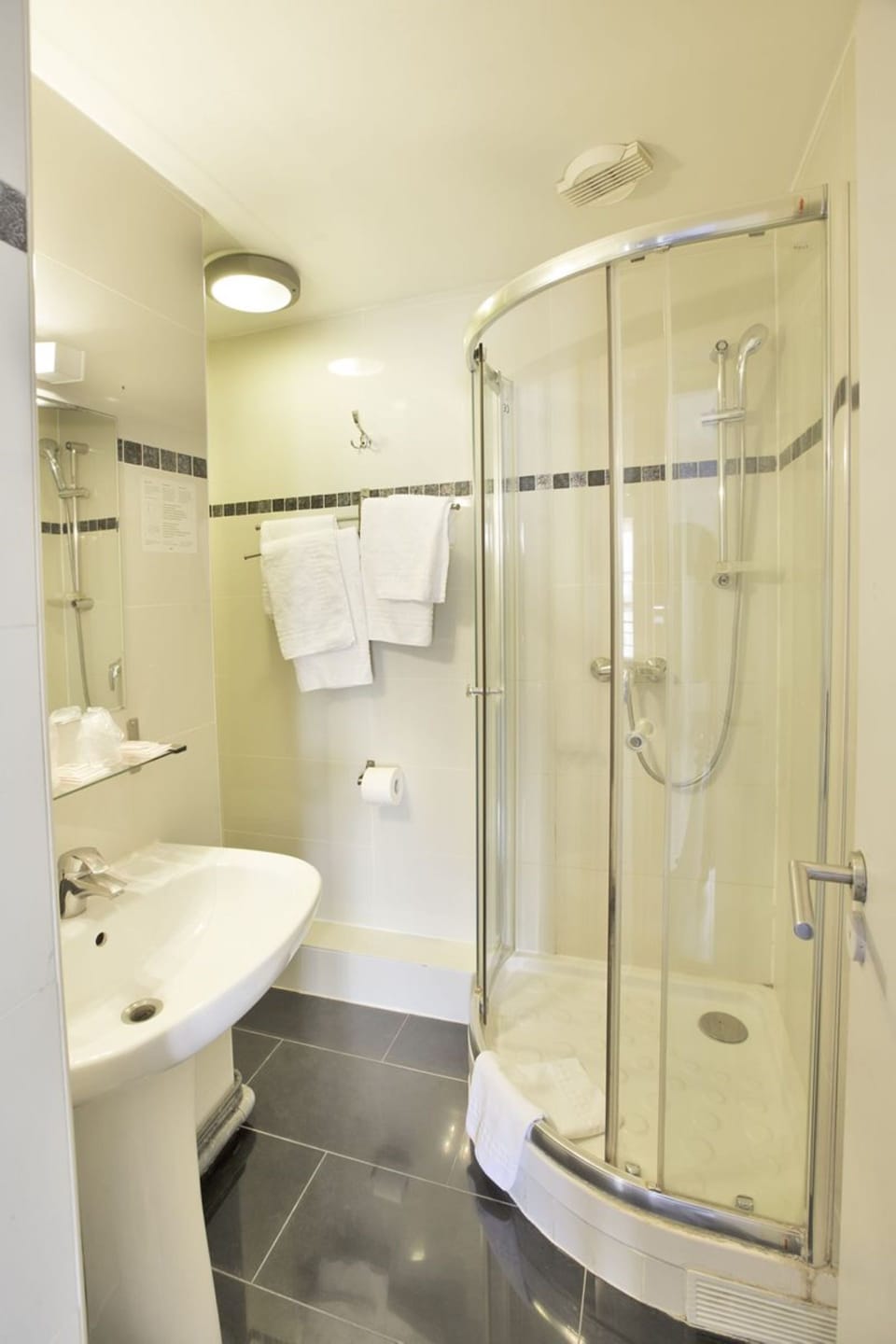 Shower, hydromassage showerhead, towels