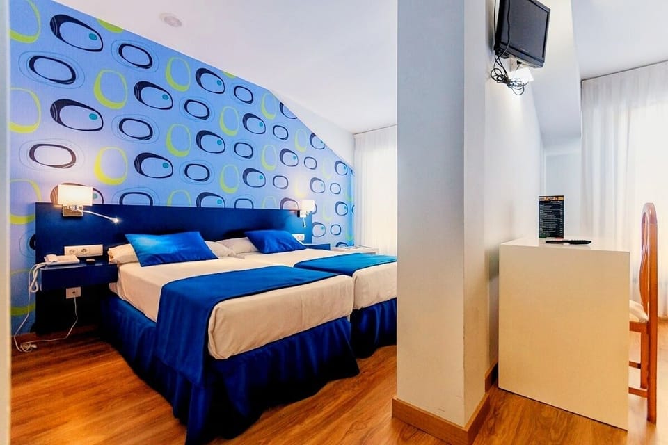Standard Double or Twin Room | Desk, blackout drapes, free cribs/infant beds, free WiFi