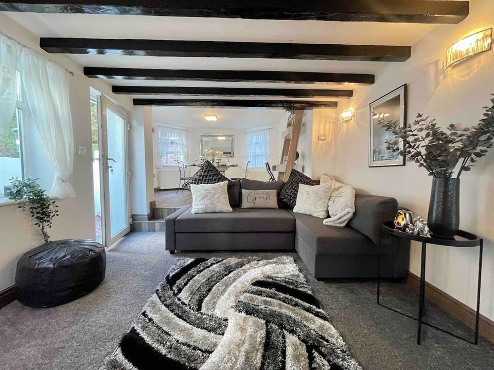 Cozy and lovely living room with a double sofa bed 