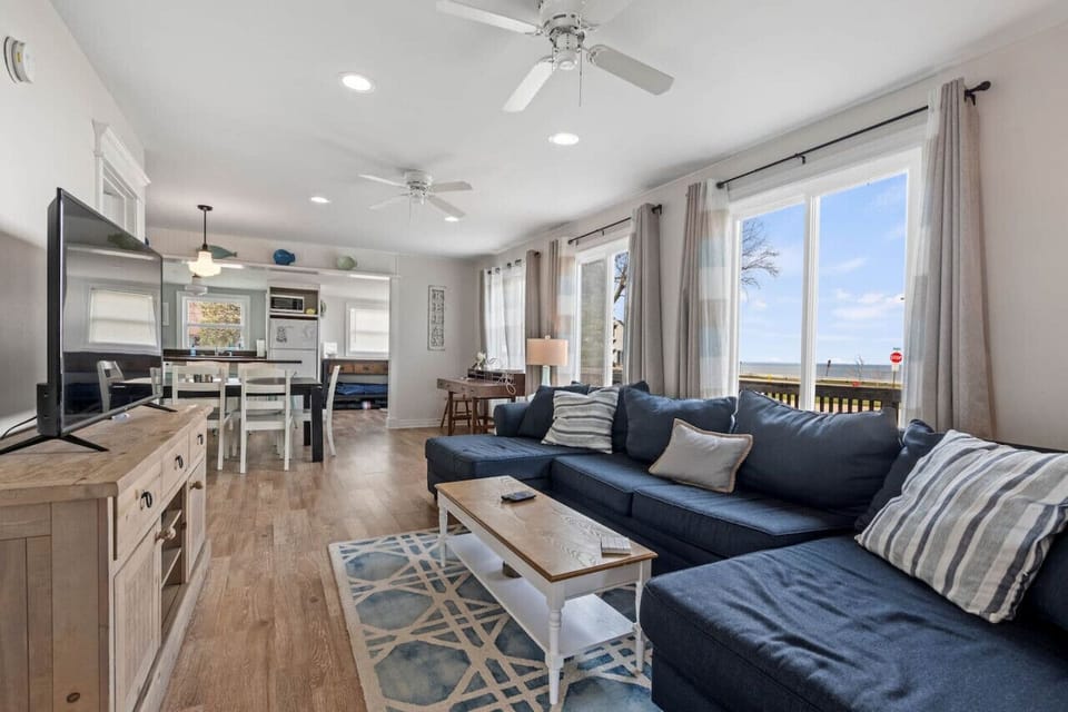 Living room with new and comfortable couch, big enough to accommodate everyone