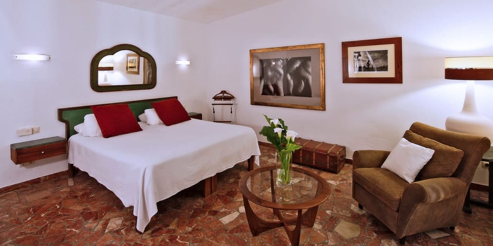 Premium bedding, down comforters, memory foam beds, minibar